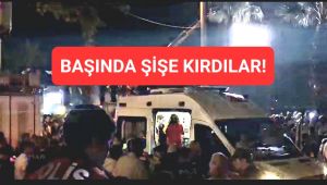 Şişeyi başında parçaladılar